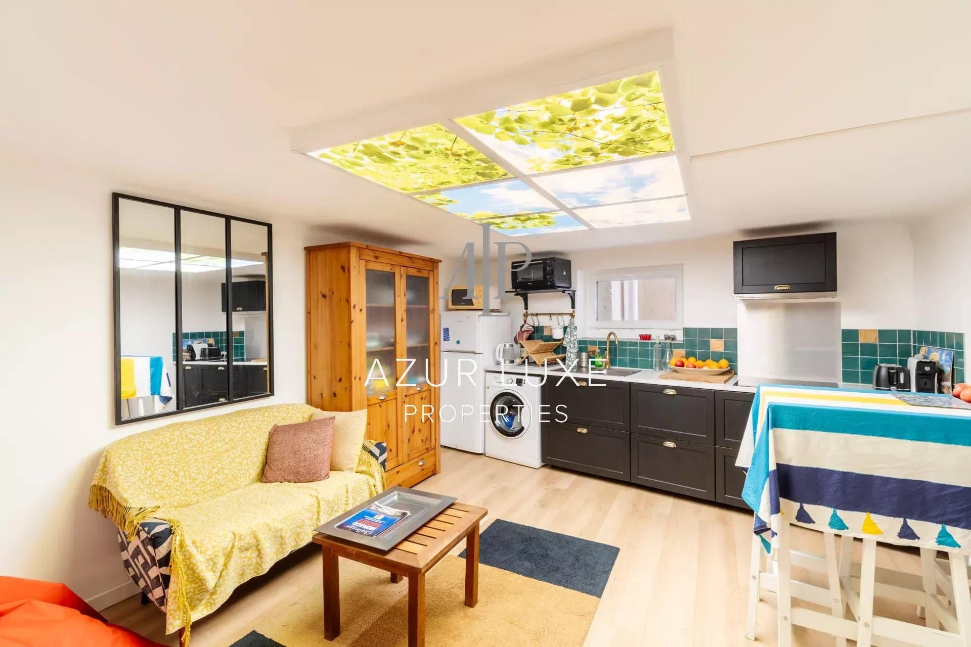 Interior of Villa Mireille in Nice Interior of a house with fitted kitchen and bright living room, contemporary style.
