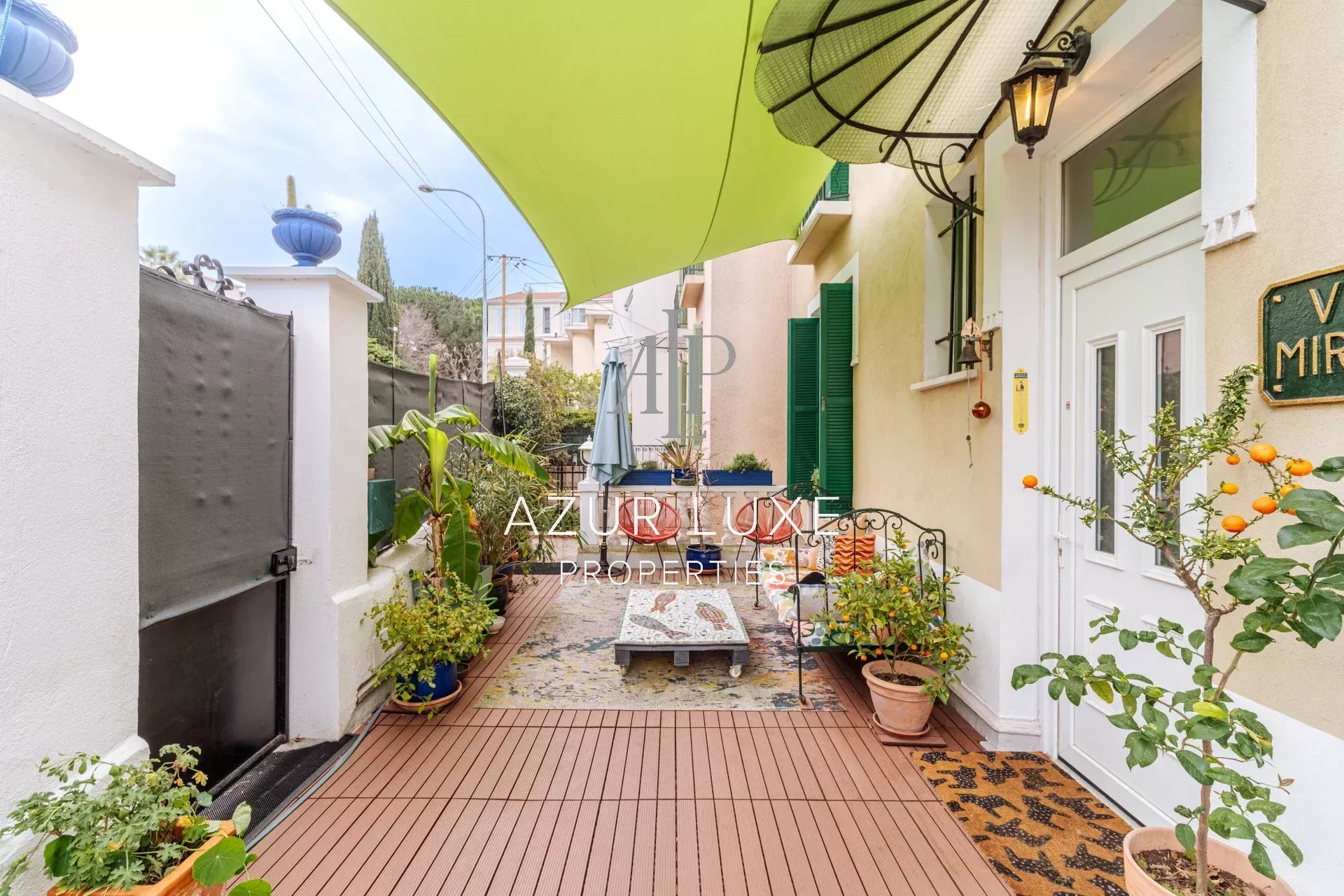 Terrace of Villa Mireille in Nice Terrace of Villa Mireille in Nice, with plants and outdoor furniture.