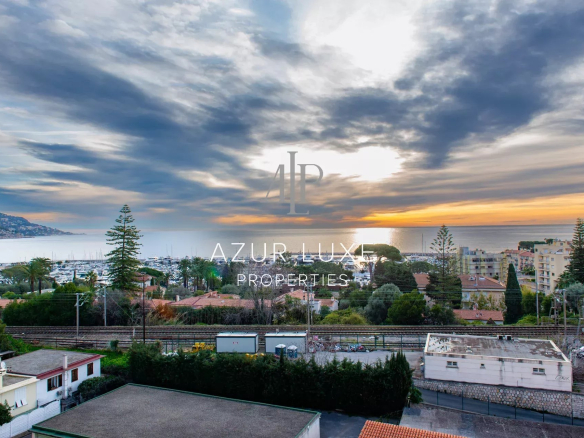 Panoramic view of the sea and the port from an apartment in Beaulieu-sur-Mer.