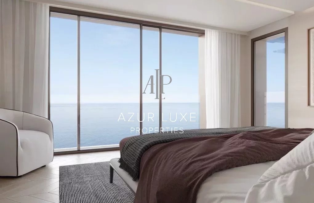 Chambre avec vue mer Chambre moderne avec vue sur la mer, grandes fenêtres et décoration contemporaine.