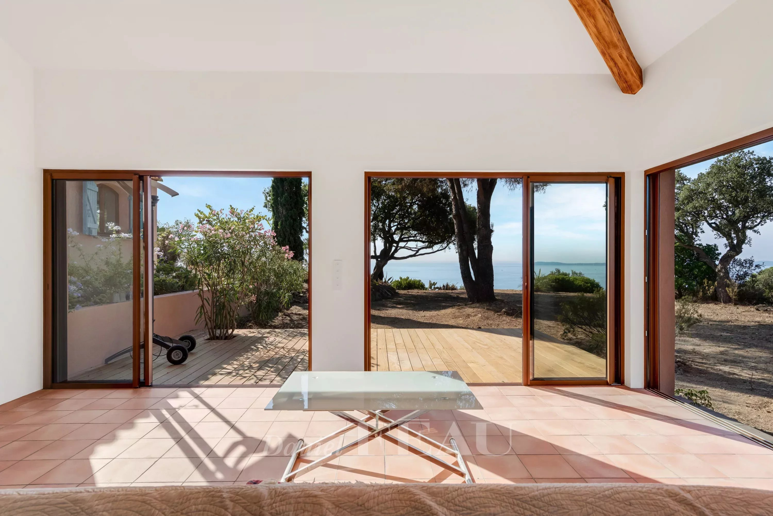 Villa interior with sea view Interior of a villa in Rayol-Canadel-sur-Mer with sea view, large bay windows.