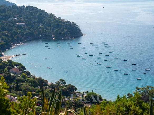 Panoramic view of the sea with boats and the coast at Rayol-Canadel-sur-Mer.