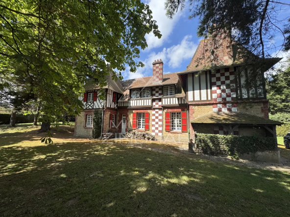 Anglo-Norman manor house with tennis court