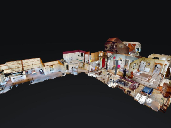 Vue en 3D d'une belle demeure en pierres, intérieur spacieux et bien agencé.