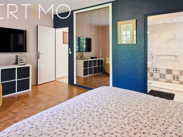 Room in a family property with television and en-suite bathroom.