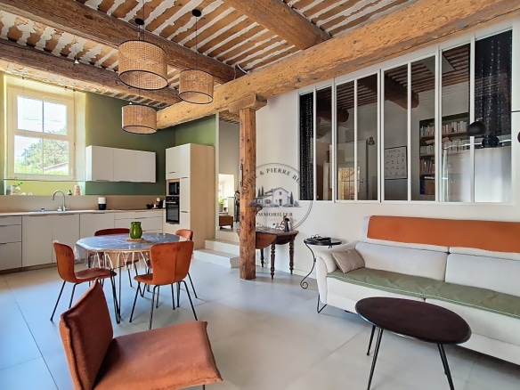 Interior of an 18th century building with modern kitchen and living room, Cheval-Blanc.