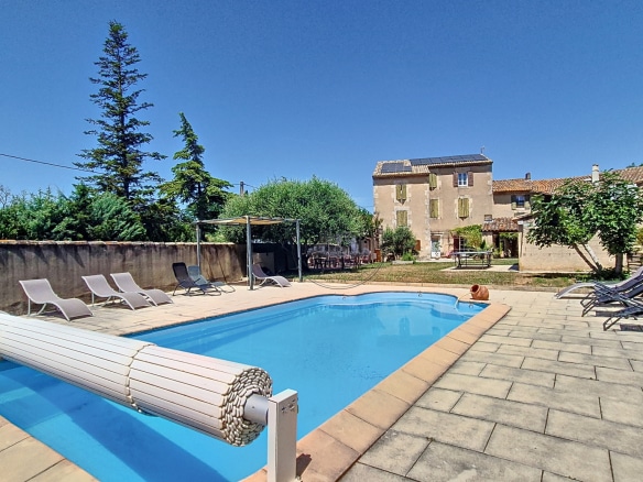 18th century building with swimming pool and outdoor space in Cheval-Blanc.