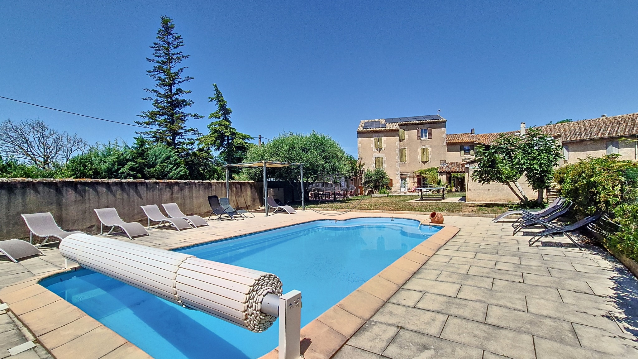 18th century building with swimming pool and outdoor space in Cheval-Blanc.