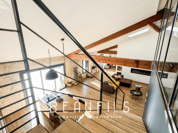 Interior of a loft with mezzanine and lounge area, Mauguio.