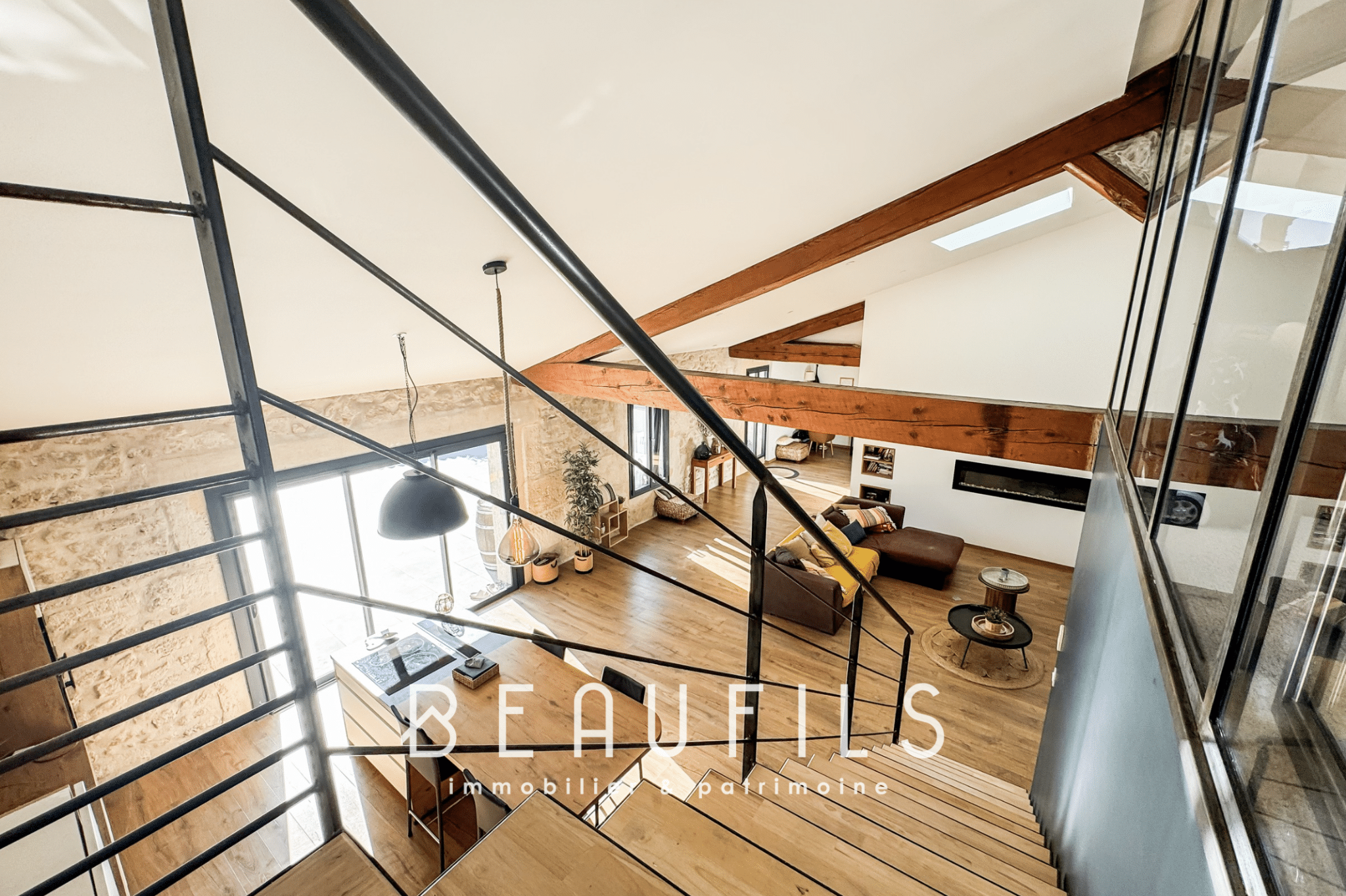 Interior of a loft with mezzanine and lounge area, Mauguio.