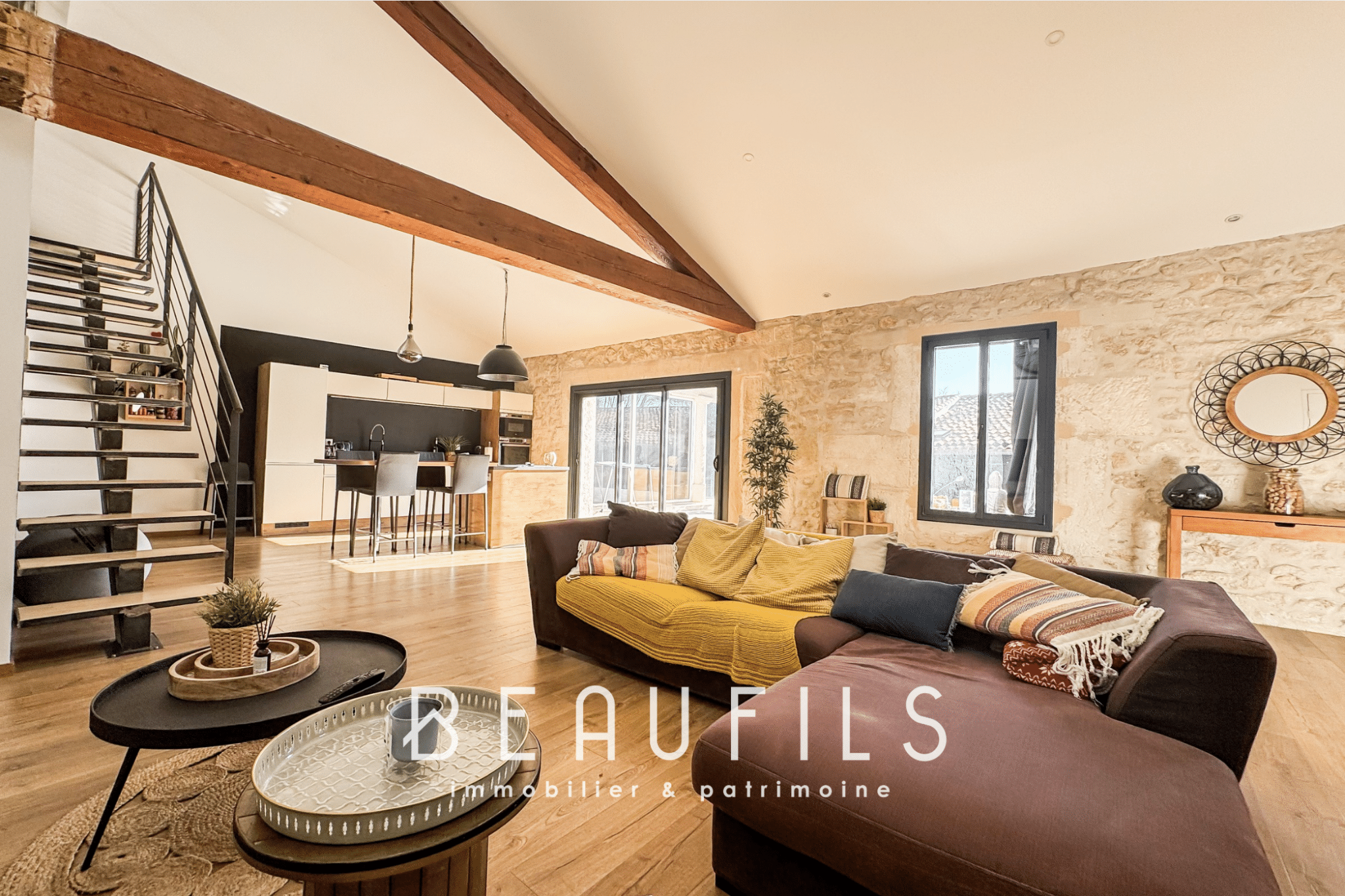 Spacious 191m2 loft with terrace, bright living room and wooden staircase in Mauguio.