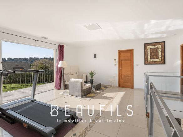 Interior of an architect-designed villa with a bright living room and unobstructed views, Nîmes West.