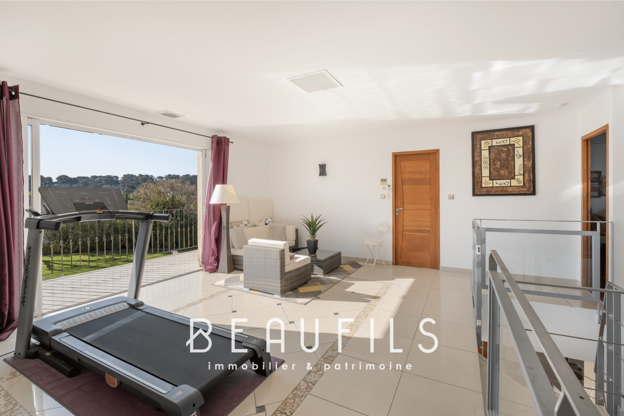 Interior of an architect-designed villa with a bright living room and unobstructed views, Nîmes West.