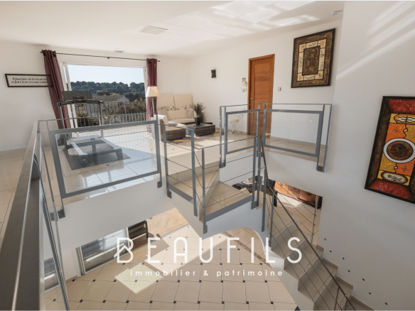 Interior of a modern architect-designed villa with mezzanine and natural light in Nîmes.