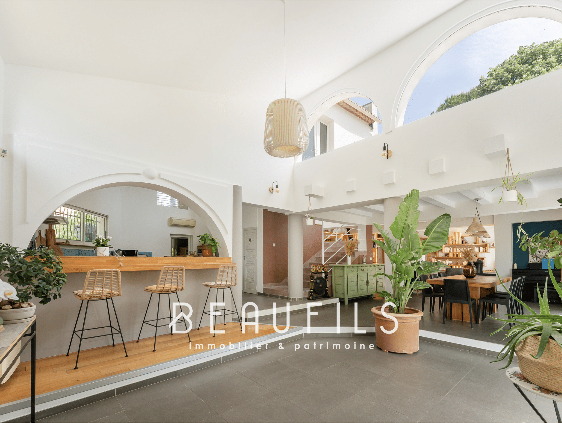 Interior of a modern architect-designed villa with open kitchen and bright living space.