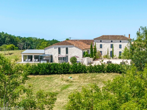 Renovated stone property with outbuildings, countryside views in Le Lédat.