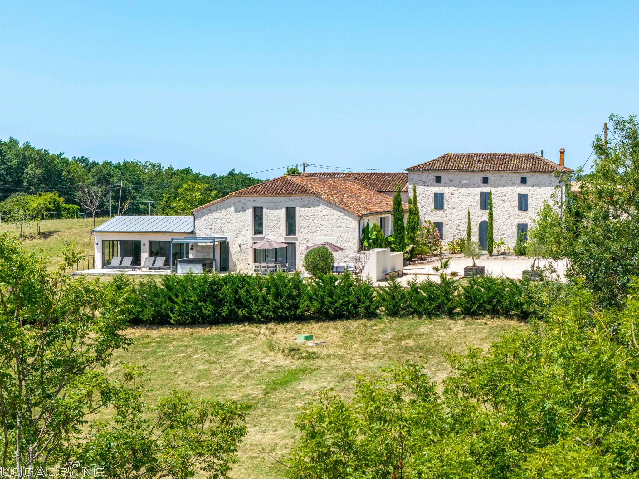Renovated stone property with outbuildings, countryside views in Le Lédat.