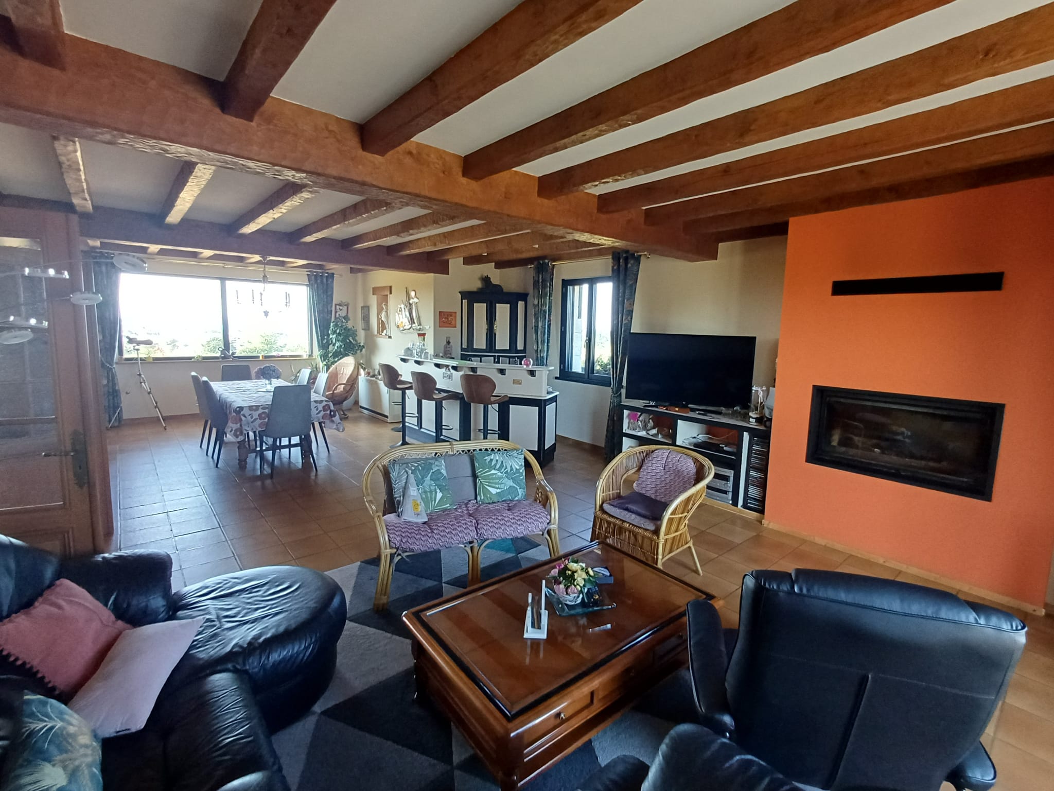 Interior of a house with a sea view, spacious and bright living room.
