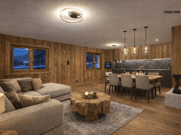 Intérieur d'un chalet rénové avec un salon, une salle à manger et des murs en vieux bois à Megève.