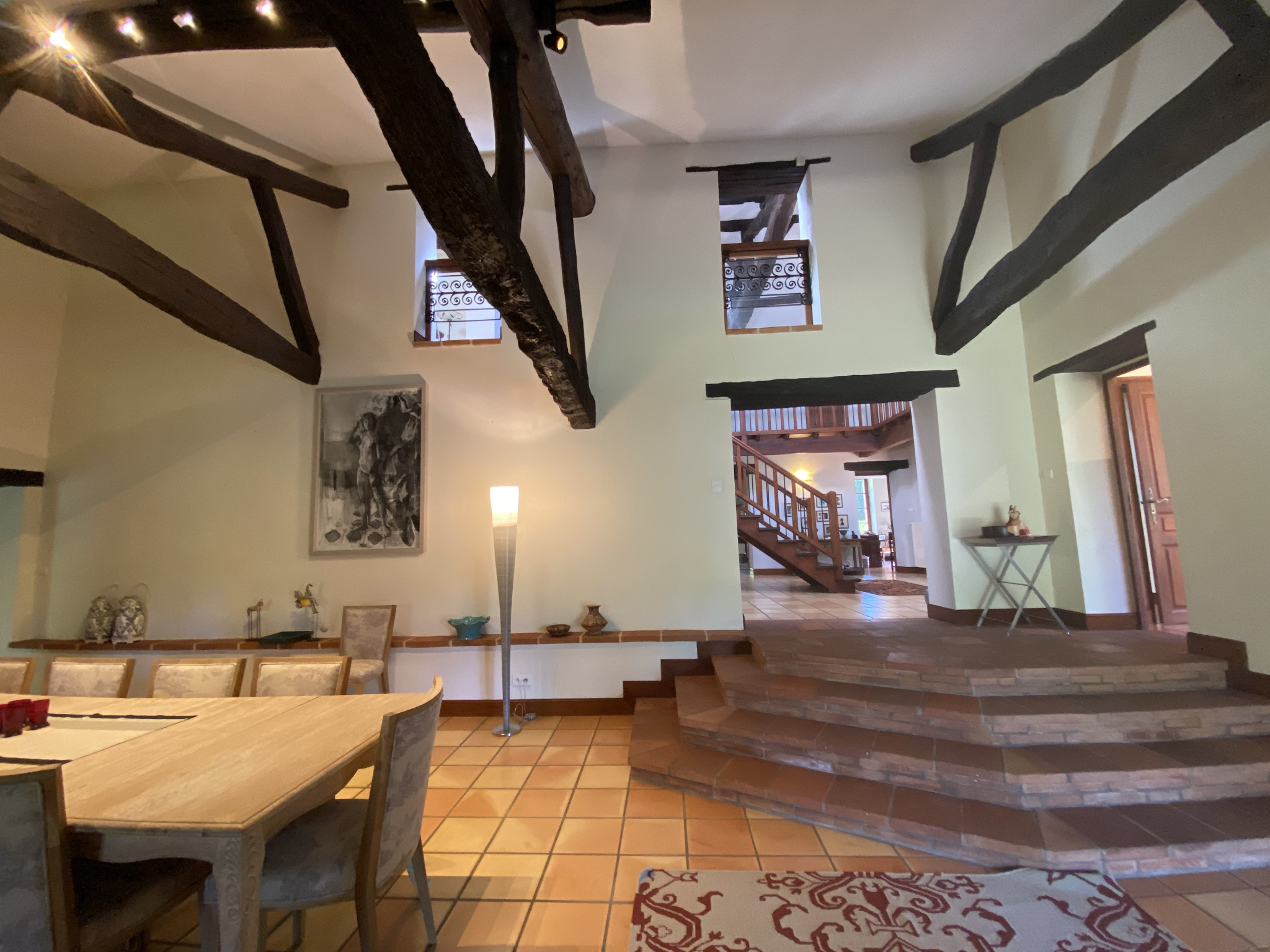 Interior of a country house in Moissac Interior of a country house in Moissac with a spacious living room and exposed beams.