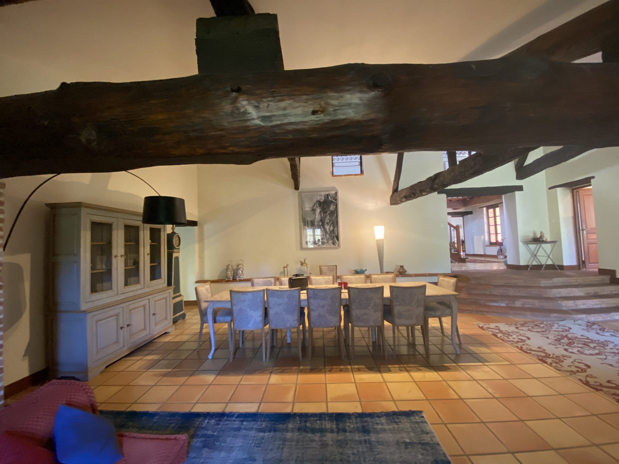 Interior of a country house in Moissac Interior of a country house in Moissac, with a large dining table and exposed beams.