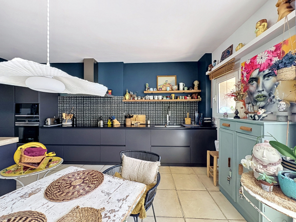 Modern and decorated kitchen in a winemaker's house in Saint-Georges-d'Orques.
