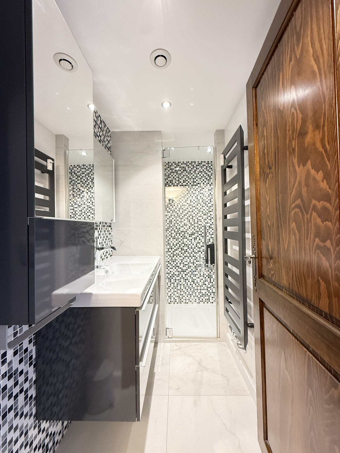 Modern bathroom Modern bathroom with mosaic tiles and walk-in shower.