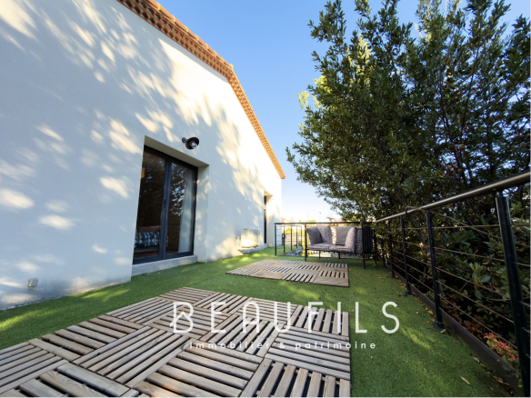 Terrace of a renovated villa with relaxation area in Frontignan.
