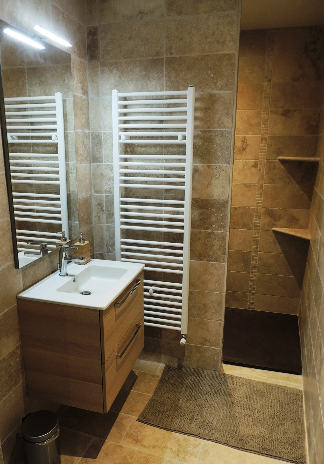 Modern bathroom Modern bathroom with shower, sink and towel warmer.