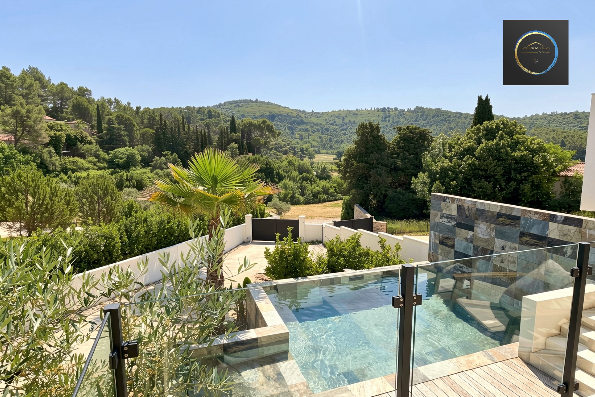 Contemporary villa in Clermont-l'Hérault View of a contemporary villa with swimming pool and green landscape in Clermont-l'Hérault.