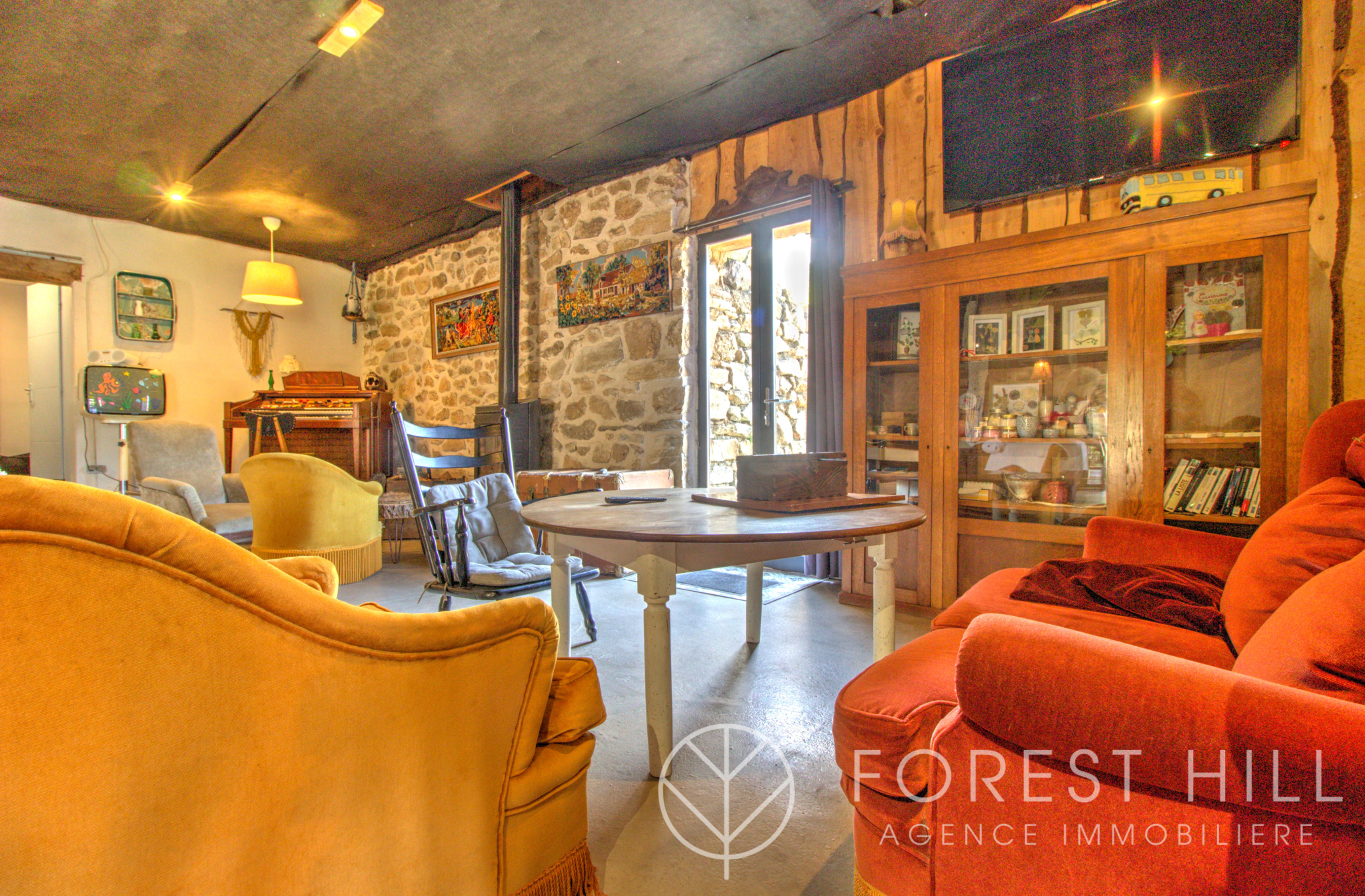 Interior of a property with comfortable furniture and warm decor.
