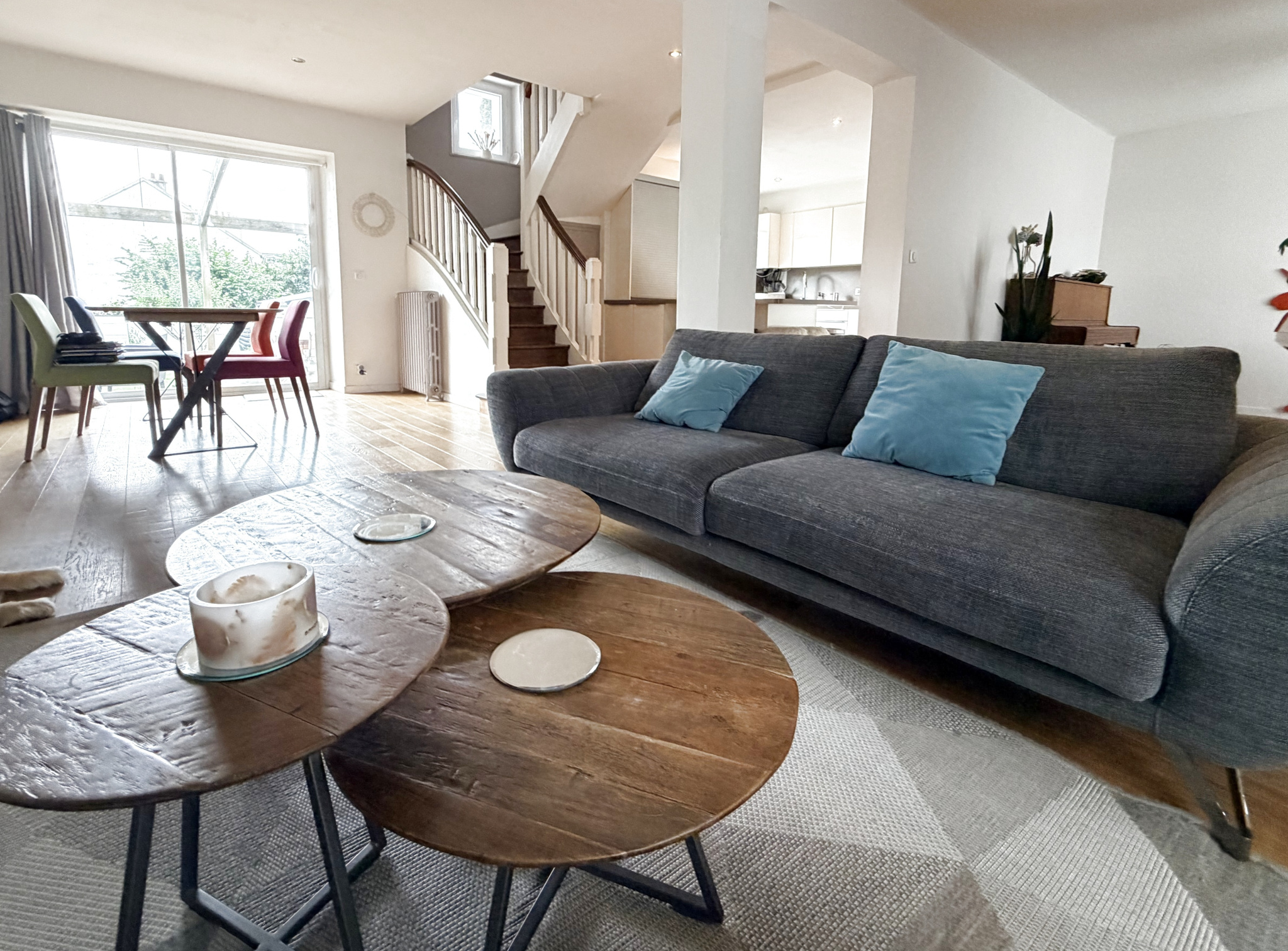 Interior of a renovated house with a modern living room and dining room, Kerdrain district in Auray.