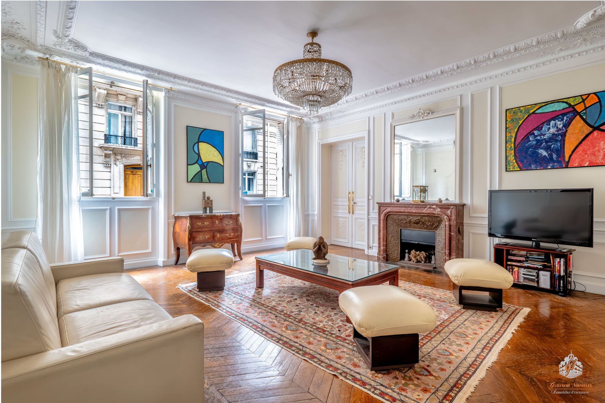 Elegant ground-floor apartment in Paris Interior of an elegant garden-level apartment in Paris with a bright living room and refined decor.