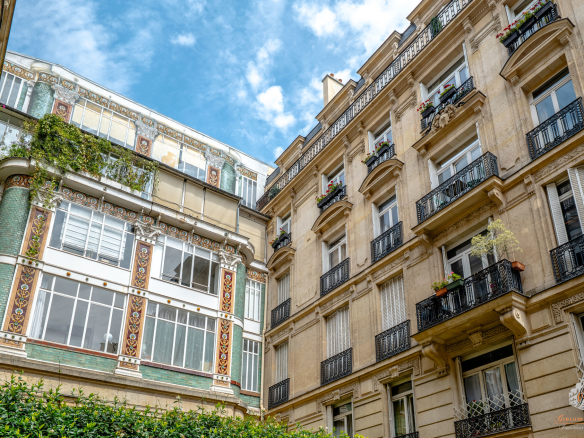 View of a Parisian building with balconies and a veranda, Paris 17th arrondissement