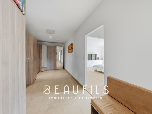 Interior of a modern villa with hallway and wooden furniture