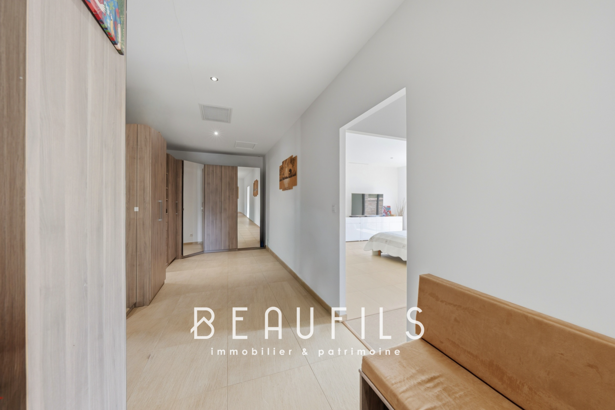 Interior of a modern villa with hallway and wooden furniture