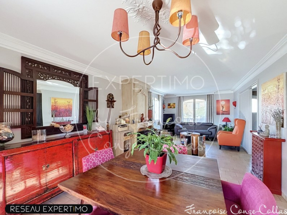 Intérieur d'une maison à Saint-Cyr-l'École avec un séjour lumineux et une salle à manger.