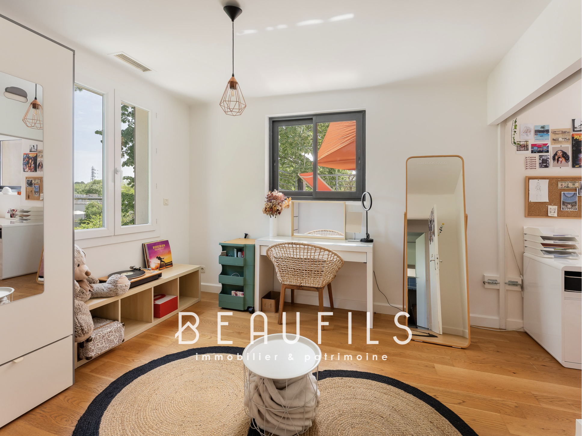 Room in an architect's villa Bright room with desk and mirror, decorated in a modern style.