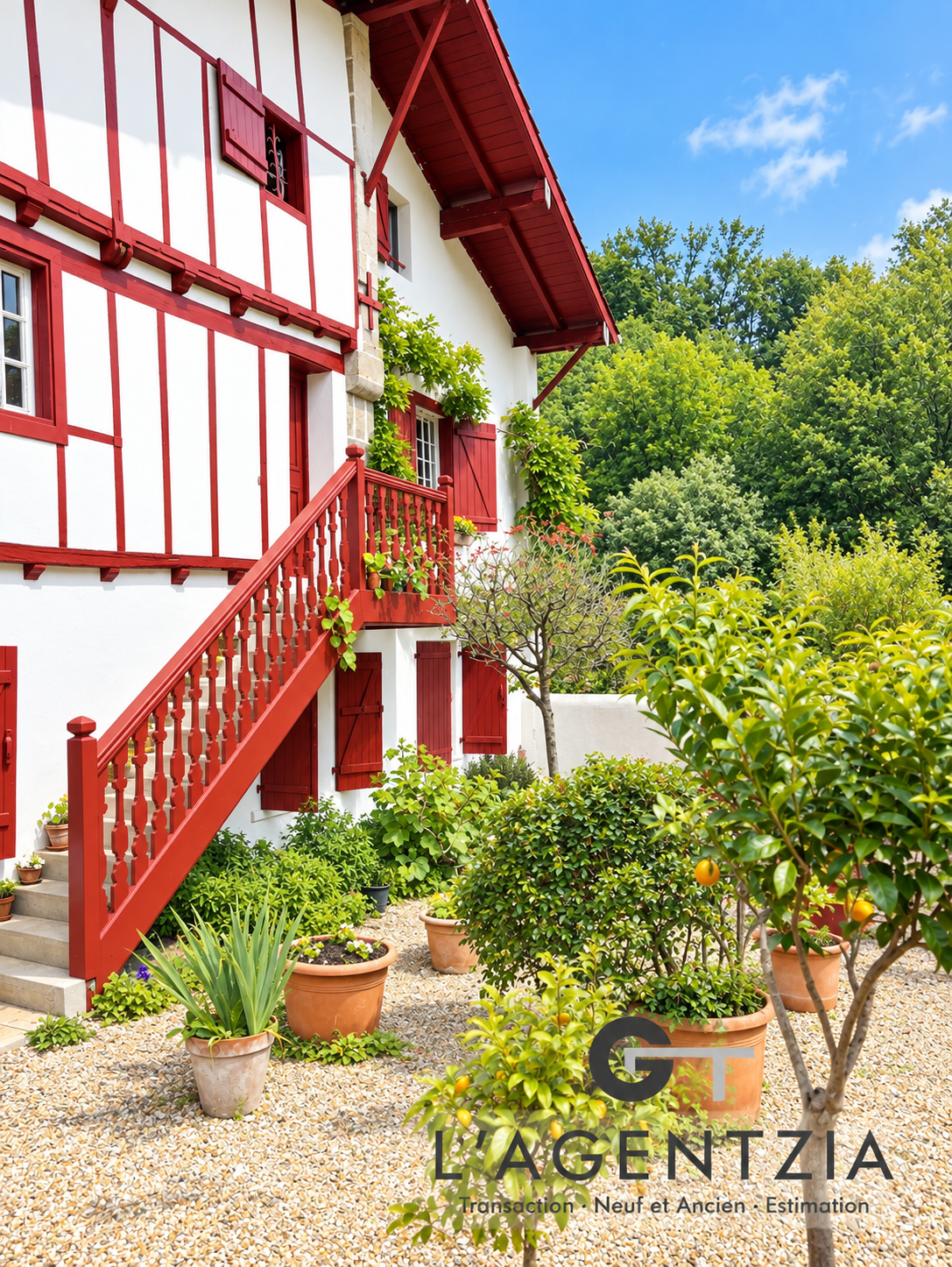 17th century Labourdine farmhouse in Cambo-les-Bains, with half-timbered facade and flower garden.