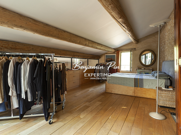 Room in a renovated house in Villars, with bed, wardrobe and natural light.