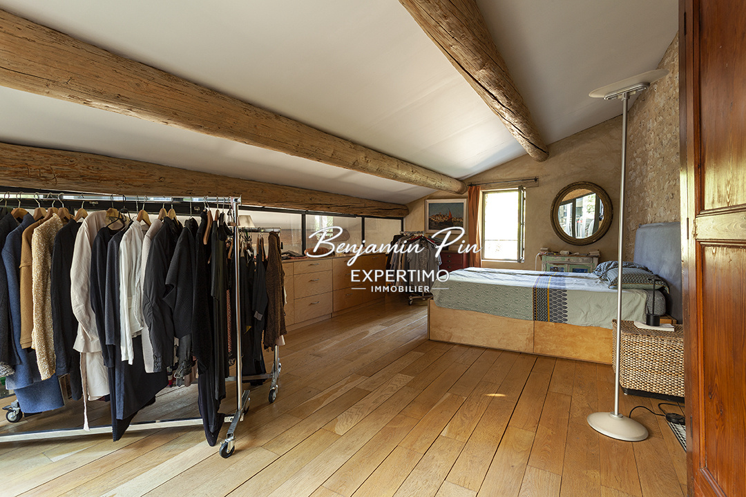 Modern room in Villars Room in a renovated house in Villars, with bed, wardrobe and natural light.