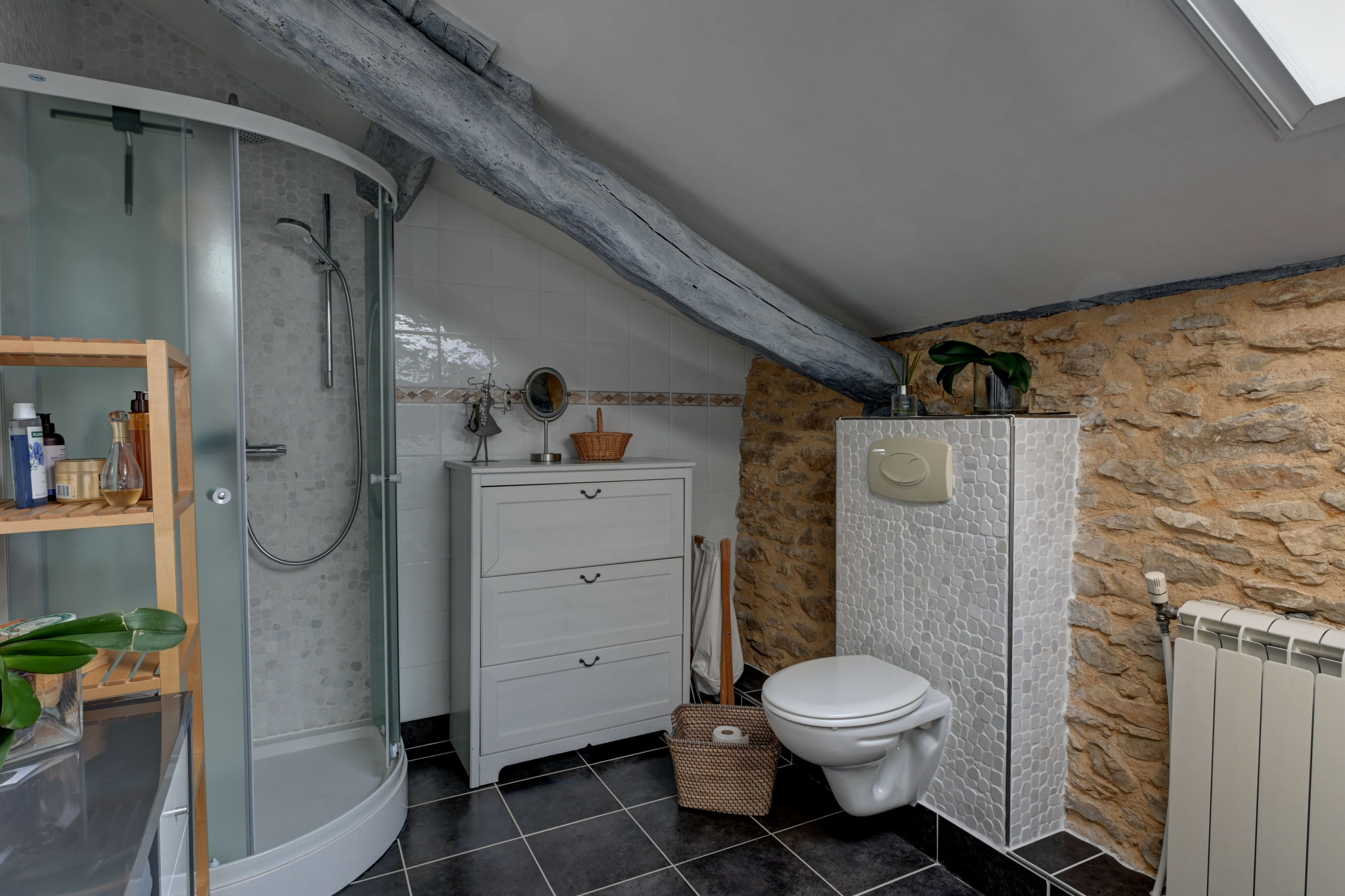 Estate bathroom Modern bathroom with shower, sink and toilet in a stone estate.