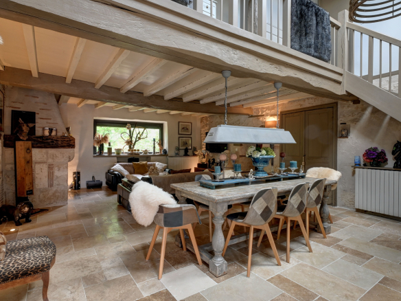 Interior of an elegant house with dining room and living room, tastefully decorated.