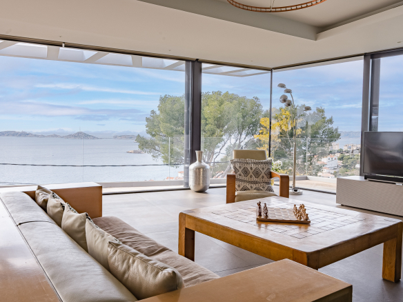 Interior of a modern villa with sea views in Marseille, panoramic windows.