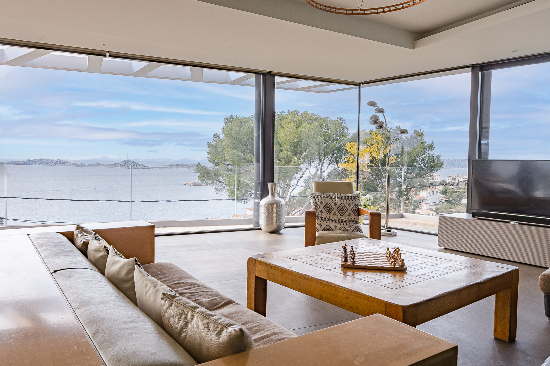 Modern villa with sea view in Marseille Interior of a modern villa with sea views in Marseille, panoramic windows.