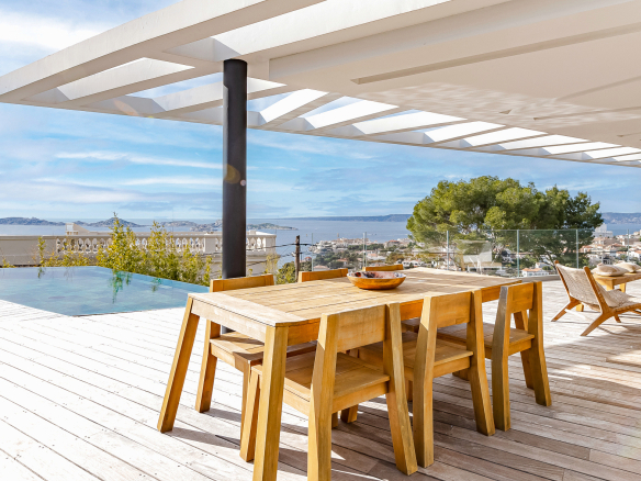 Wooden terrace with sea view and infinity pool, Roucas Blanc, Marseille.