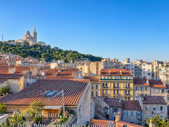 Unobstructed view of Marseille with the Notre-Dame de la Garde basilica in the background.