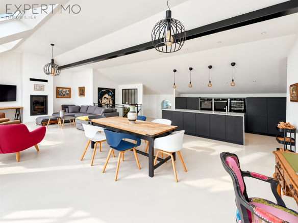 Interior of a contemporary property with living room and dining room in Relecq-Kerhuon.