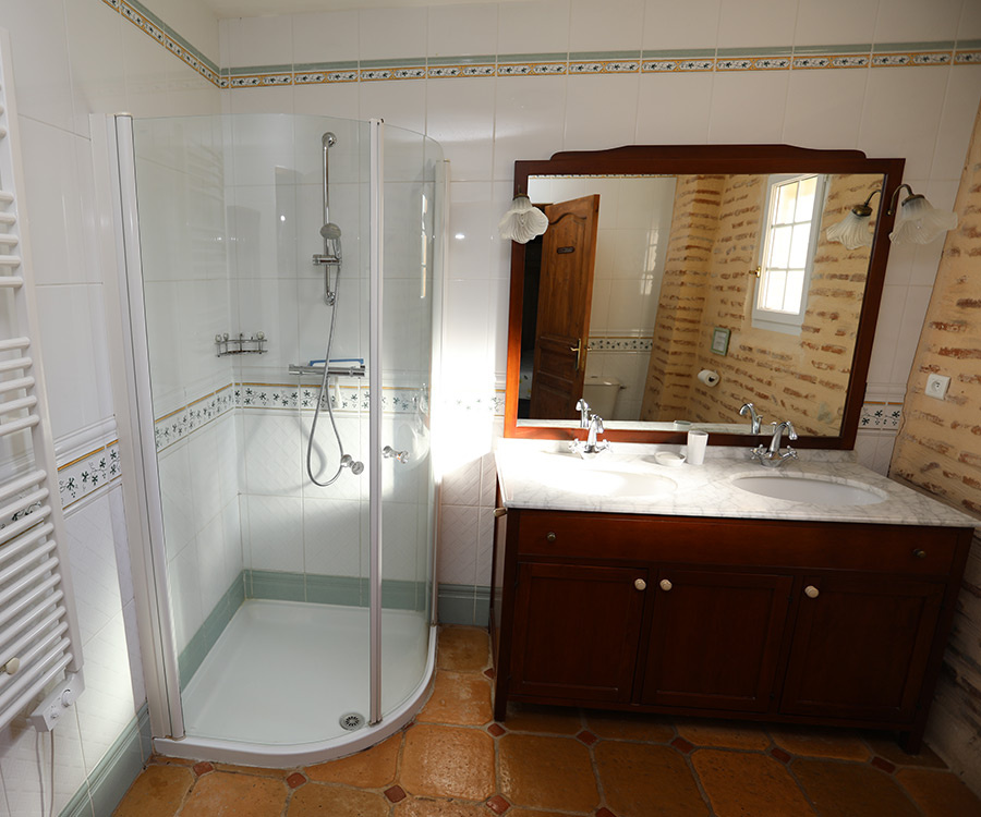 Modern bathroom Bathroom with shower, mirror and wooden vanity unit, tiled floor