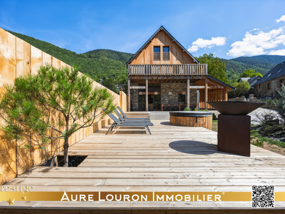 Chalet de prestige avec terrasse en bois et vue sur la montagne à Guchan.